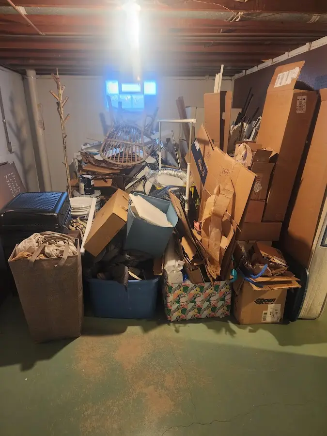 Roll-off dumpster container at job site for 8 Yard Dumpster Rental in Adamsville